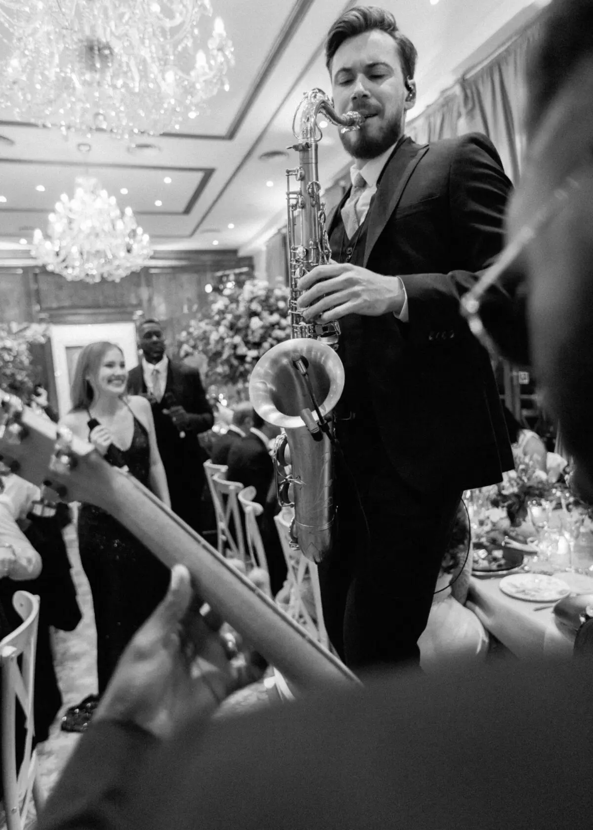 saxophonist playing on chair - - Buckinghamshire wedding