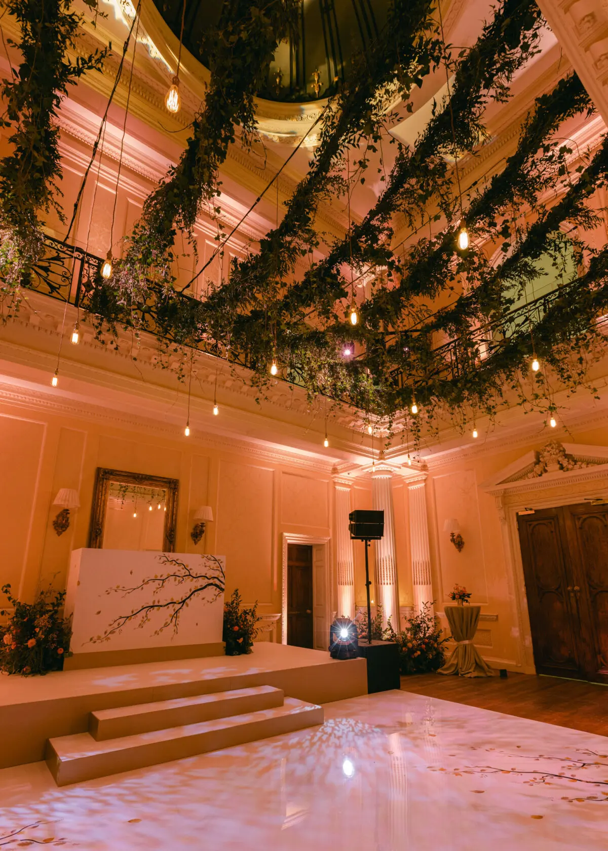 evening party design with hanging foliage and lights - Buckinghamshire wedding