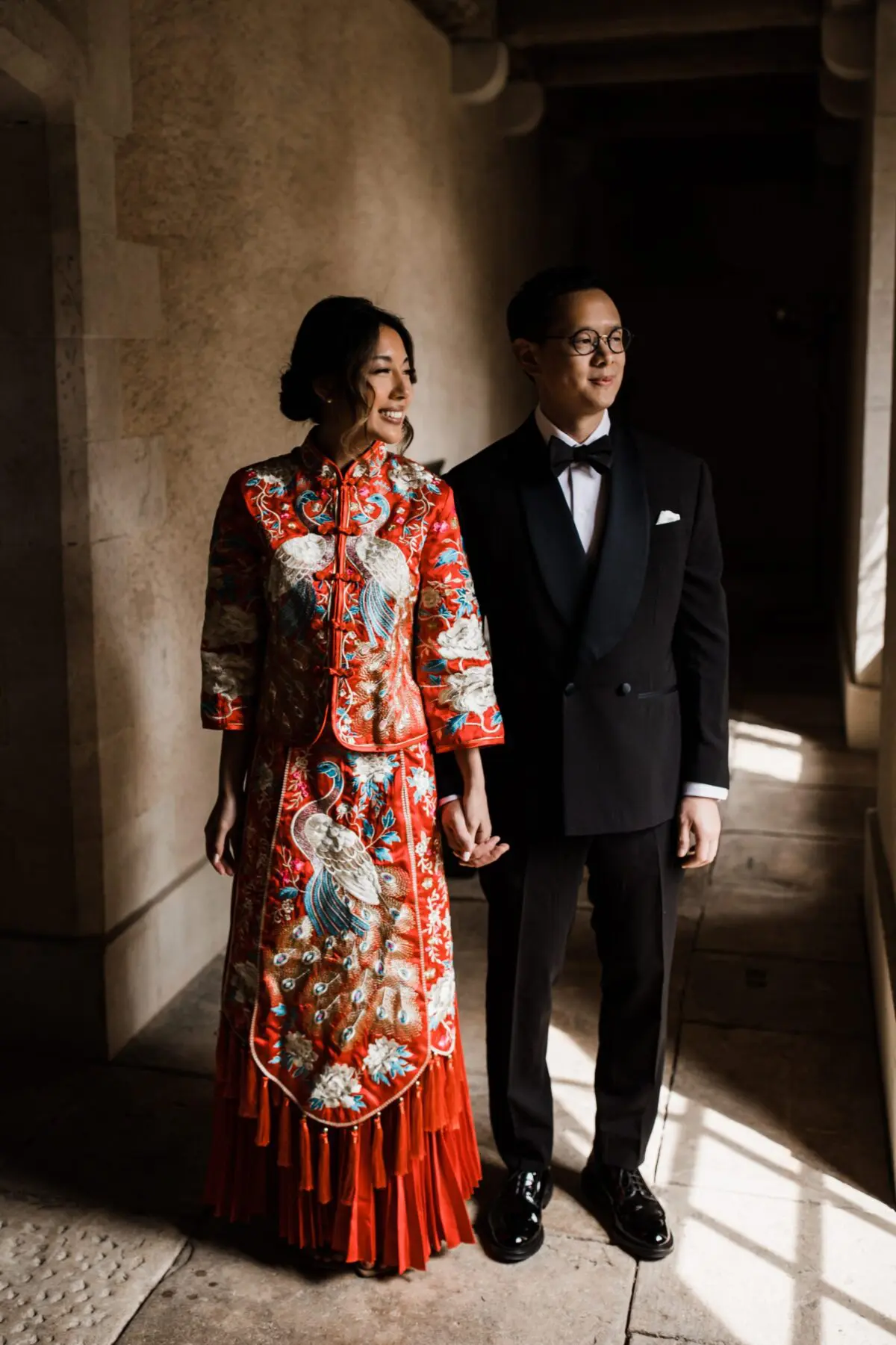 bride and groom dressed in Chinese ceremony outfit - wedding designer