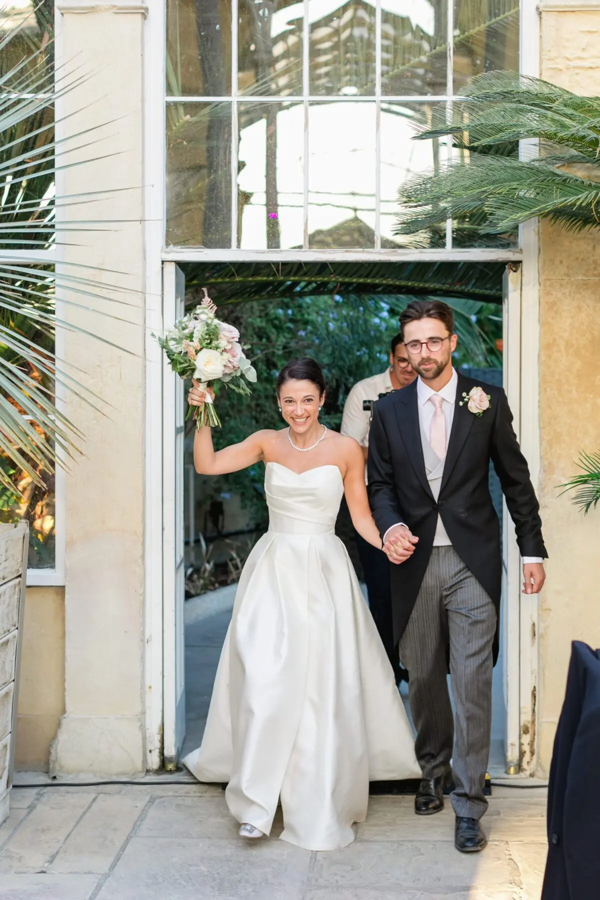 bride and groom making entrance into dinner - Syon Park Wedding