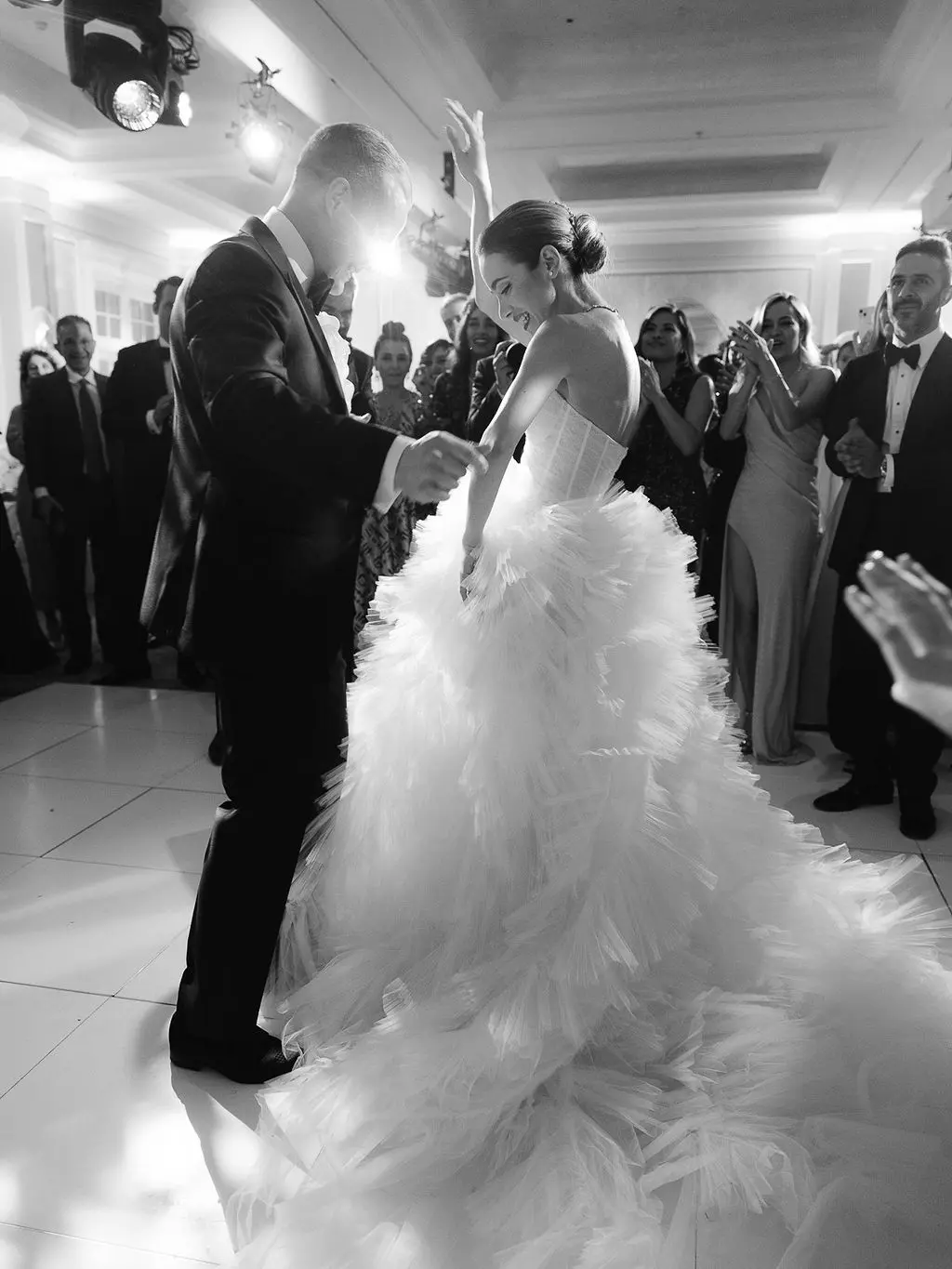 Bride and groom dancing cake knife dance Persian wedding - Vogue wedding feature