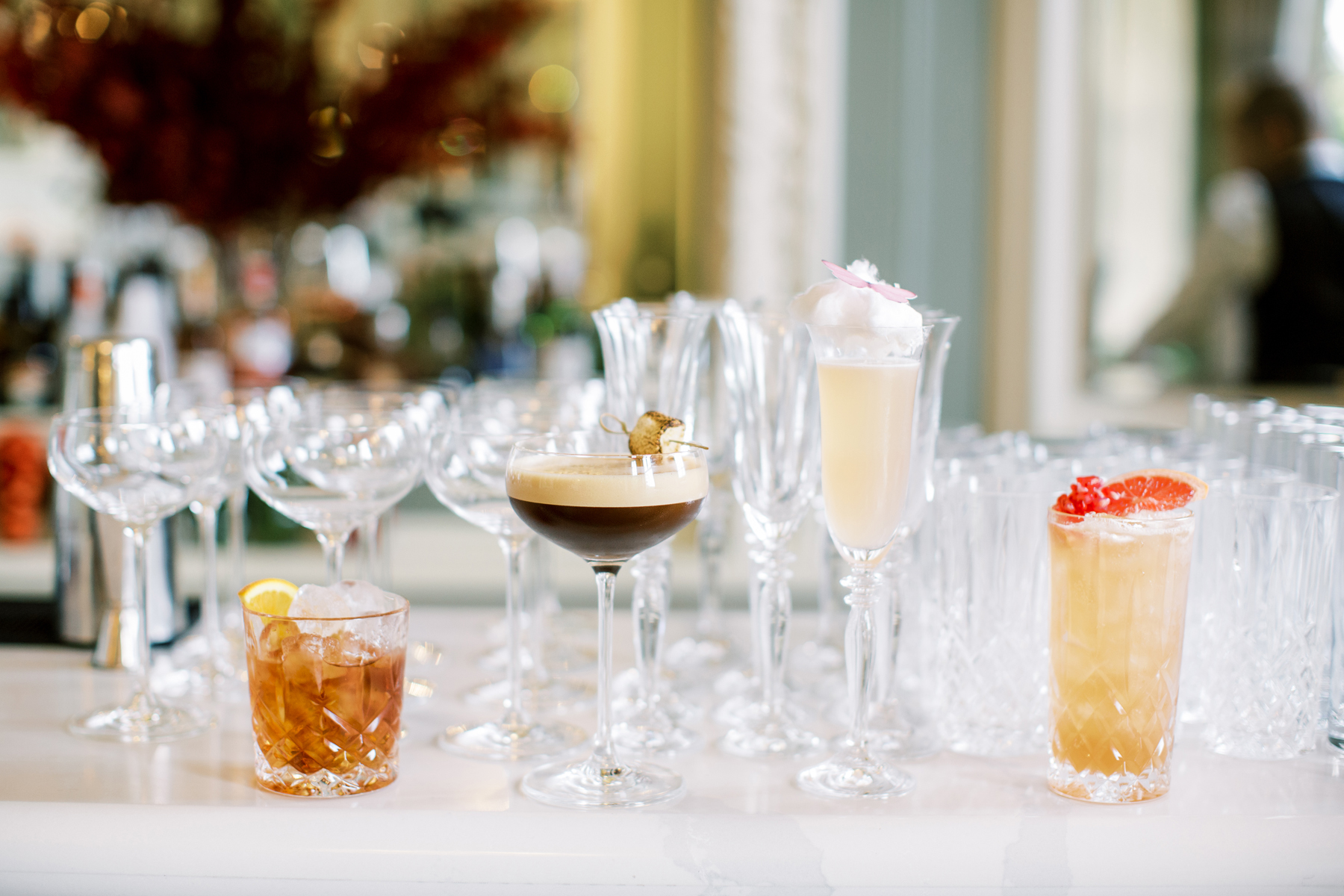 four cocktails on the bar Luxury event planner