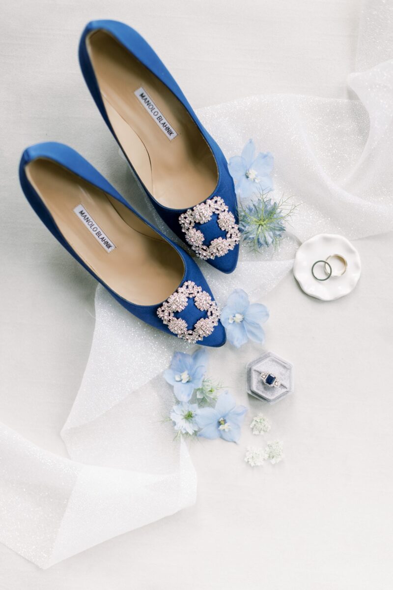 Blue Manolo Blahnik shoes with sapphire engagement ring - hedsor house wedding