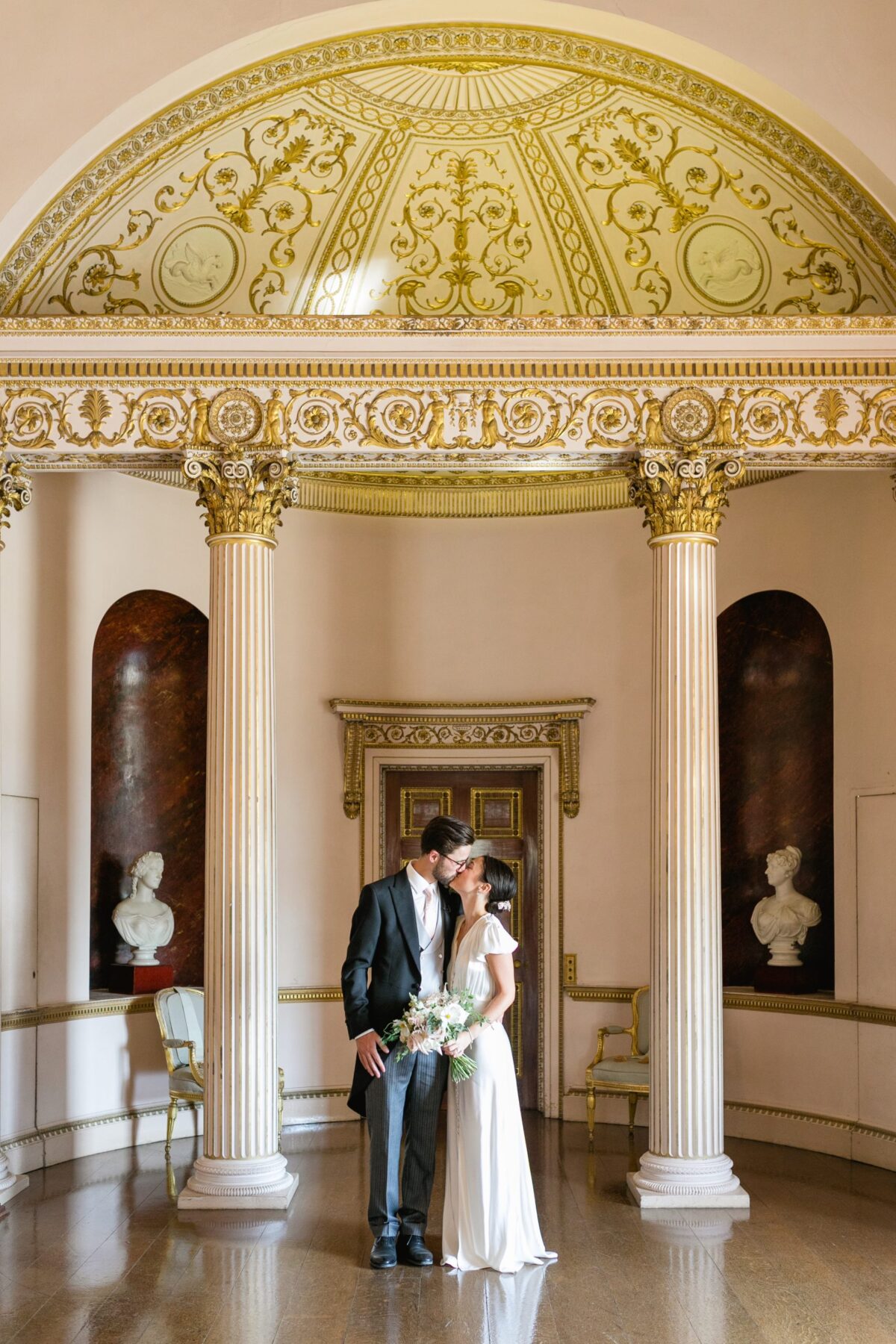 bride and groom in mansion house - Syon Park Wedding